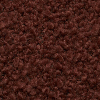 Reddish-brown looped stretch fabric texture with a dense, coiled pile and subtle sheen, displaying a plush, voluminous surface.